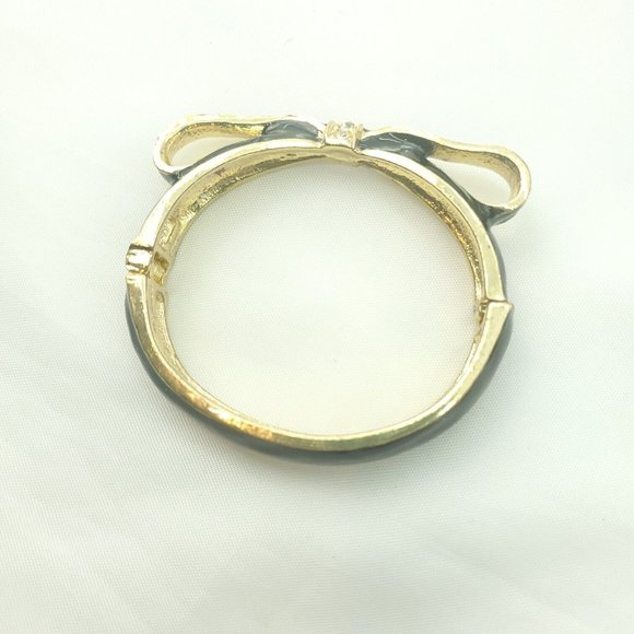 Womens Black And Gold Bow Wrist Fashion Jewelry Spring Ring Bangle Bracelet - Picture 1 of 10